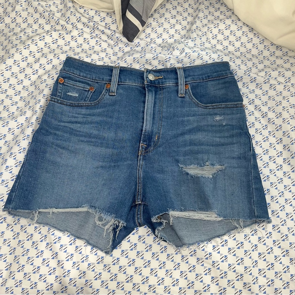 Levi’s High Rise Distressed Denim Shorts